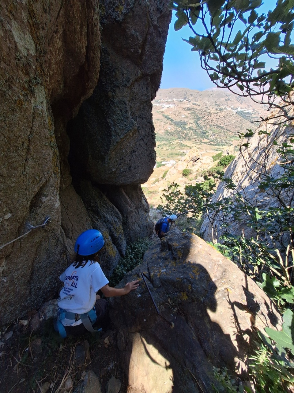George at a rest point with villages visible in the valley below